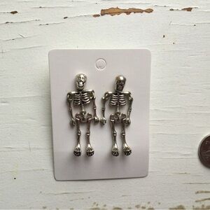 Avon Silver Skeleton Earrings